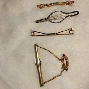 Vintage tie clasps.  From the 60s